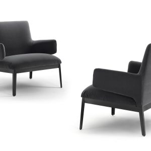 The Hug Armchair - Low version by Claesson Koivisto Rune for Arflex is an elegant and inviting piece of designer furniture that exudes luxury and sophistication. Its unique "open-armed" armrests are designed to resemble a welcoming hug, inviting you to sit and relax in comfort. Side and Back View